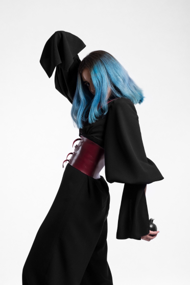 Styled garment in the research colour palette, studio portrait